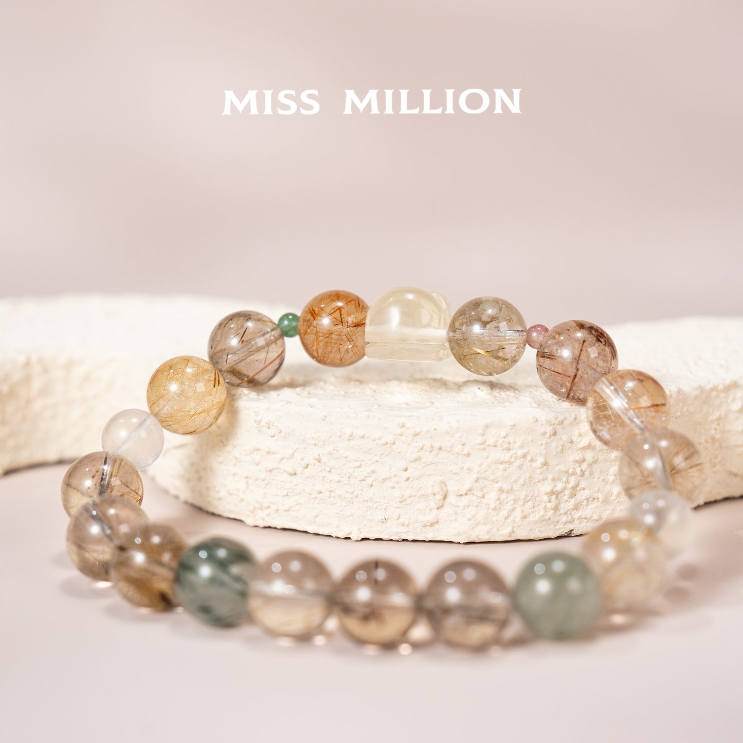 Discover a transformative crystal bracelet featuring rutilated quartz in various colors, citrine pixiu & blue moonstone. Enhance your well being&energy today