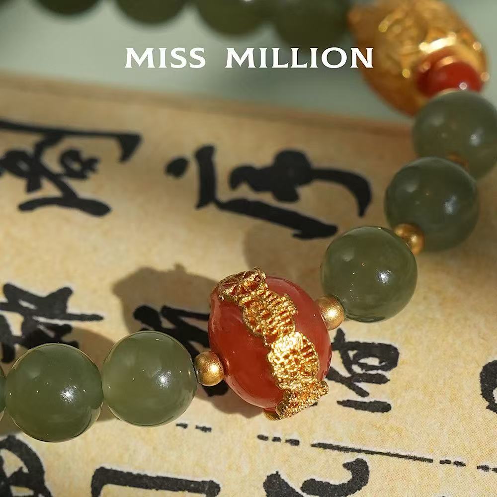 Eight Guardian Deities barrel bead for well being, happiness, and wish fulfillment