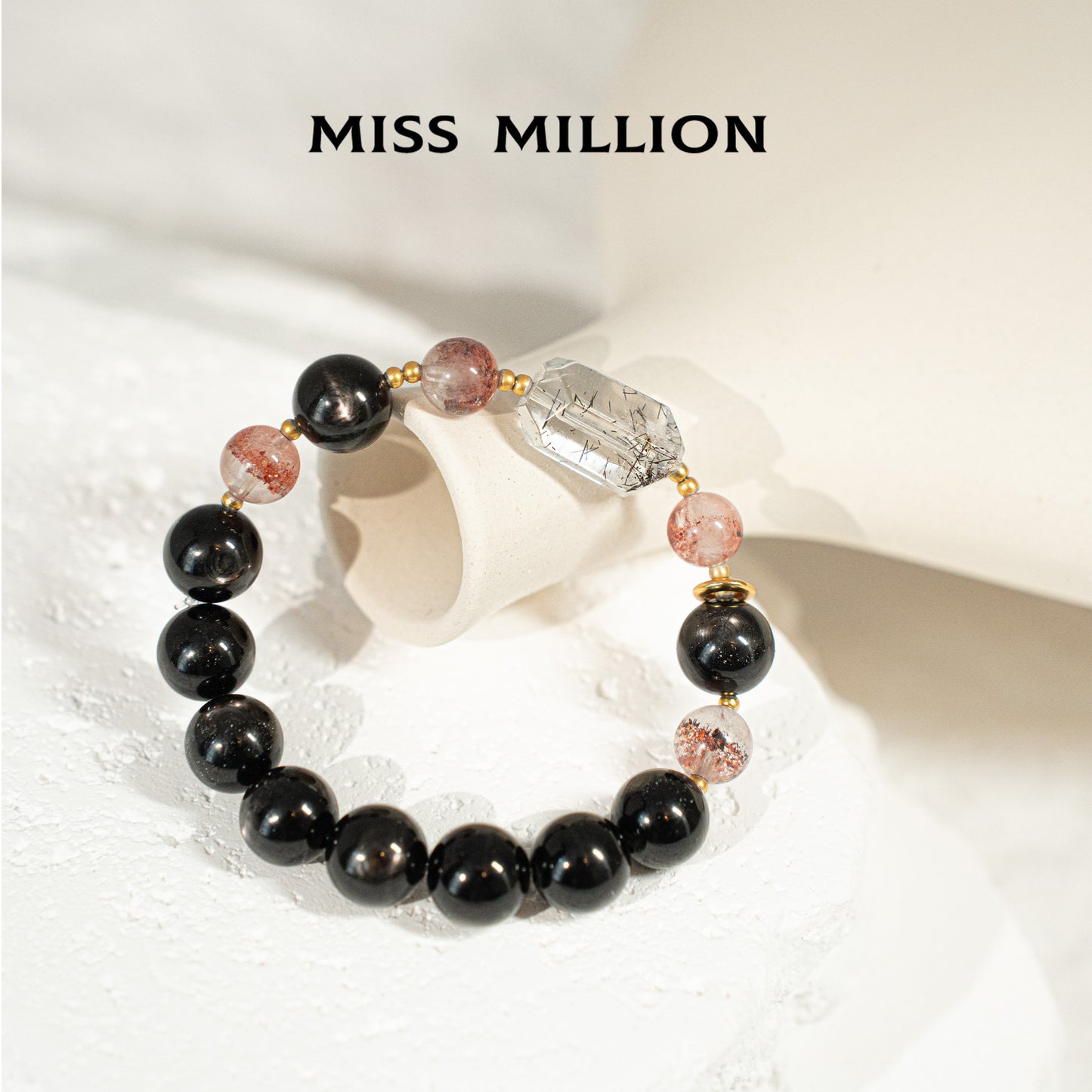 Strawberry Quartz and Super Seven Crystal, endowing it with special and powerful energy