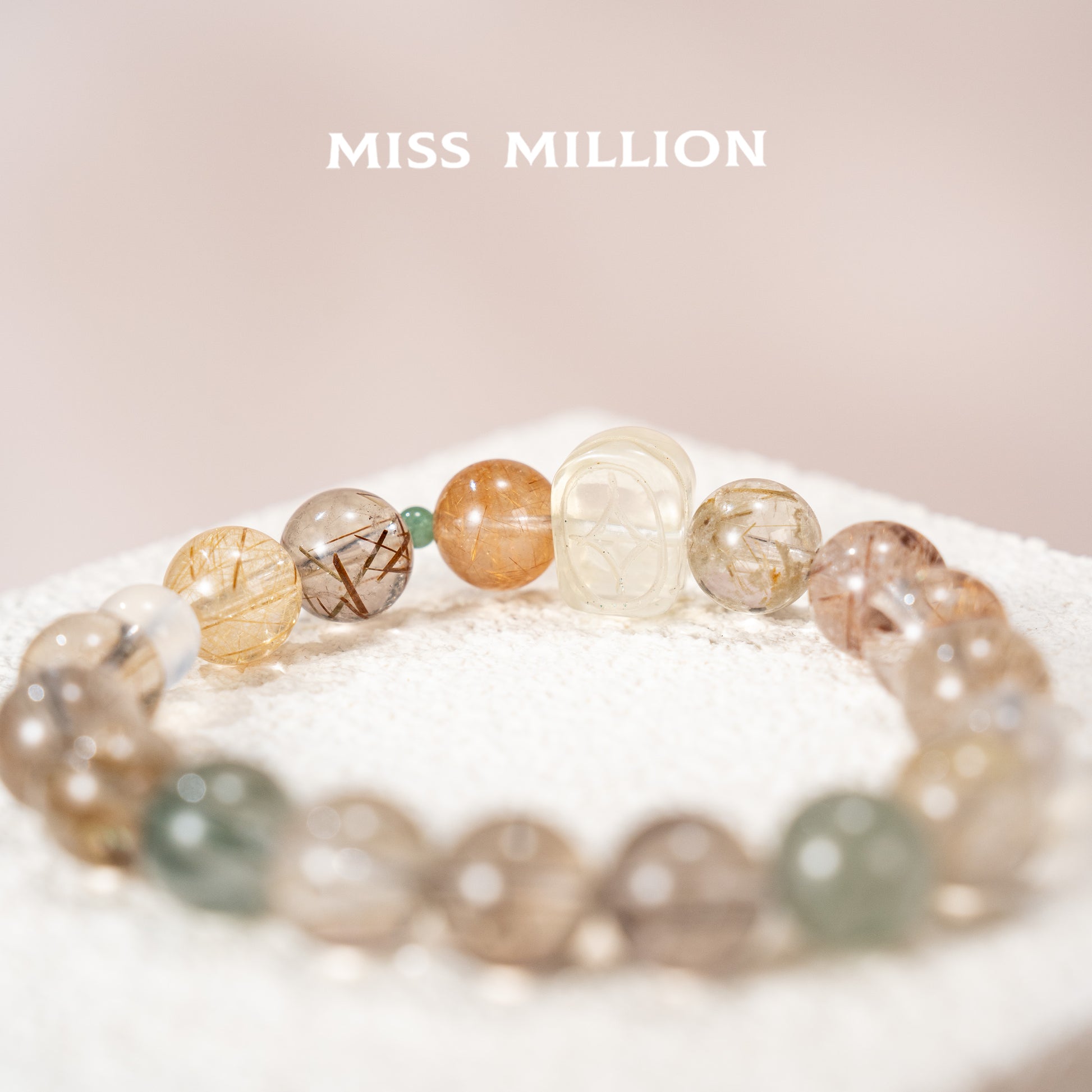 Discover a transformative crystal bracelet featuring rutilated quartz in various colors, citrine pixiu & blue moonstone. Enhance your well being&energy today